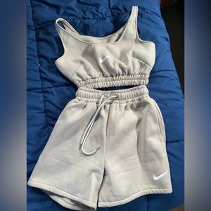 Lounge set top and bottom. Does not have Nike tags inside when I purchased.